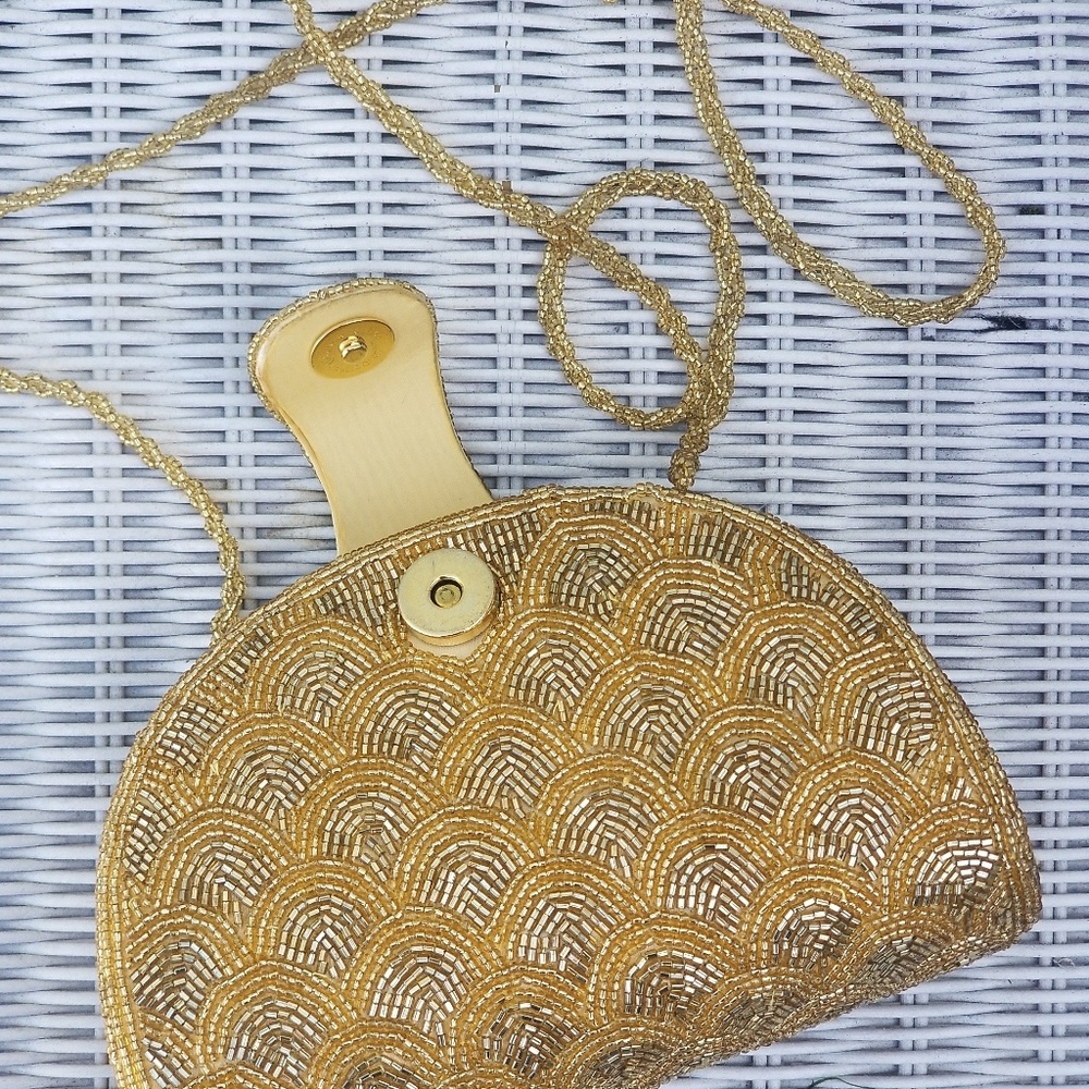 Gold beaded clutch bag